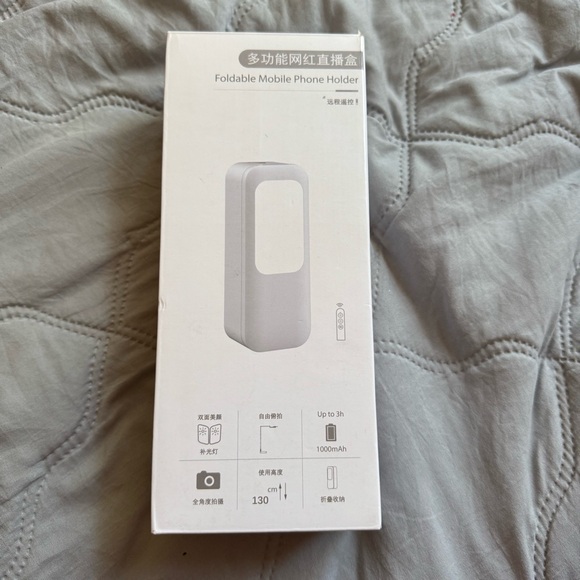 Foldable mobile phone holder multifunction box